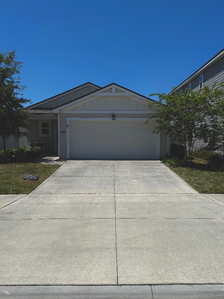 house exterior soft wash in Fleming Island FL — green algae removed